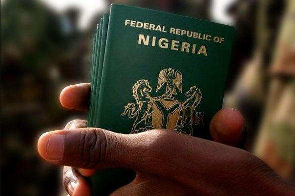 Nigerian passport with headline “FG hikes passport fees to ₦100,000 and ₦200,000 starting September 2025”