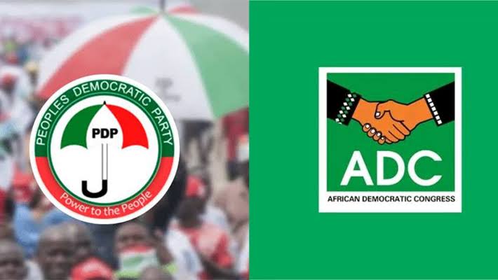 PDP and ADC party flags waving during a political rally