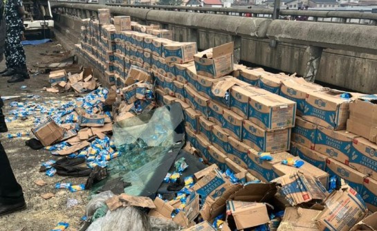 Multiple articulated trucks involved in a crash on Lagos-Ibadan Expressway with emergency responders on site.