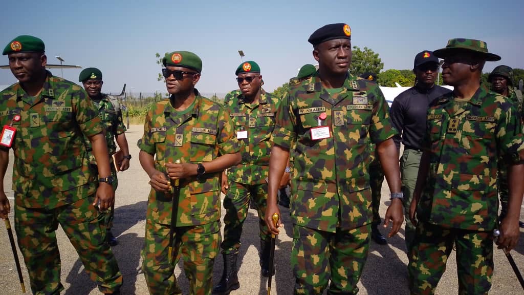 Nigerian Army commanders and troops in Kebbi State during a briefing on intensified search efforts for abducted schoolgirls.