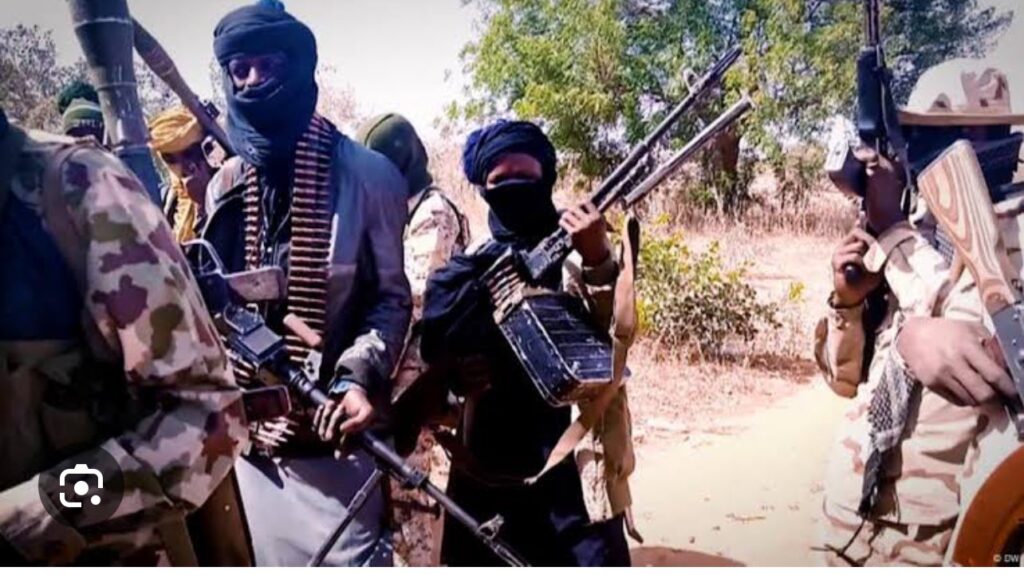 A damaged school building in Kebbi State with security presence after gunmen attacked, killing the vice principal and abducting female students.