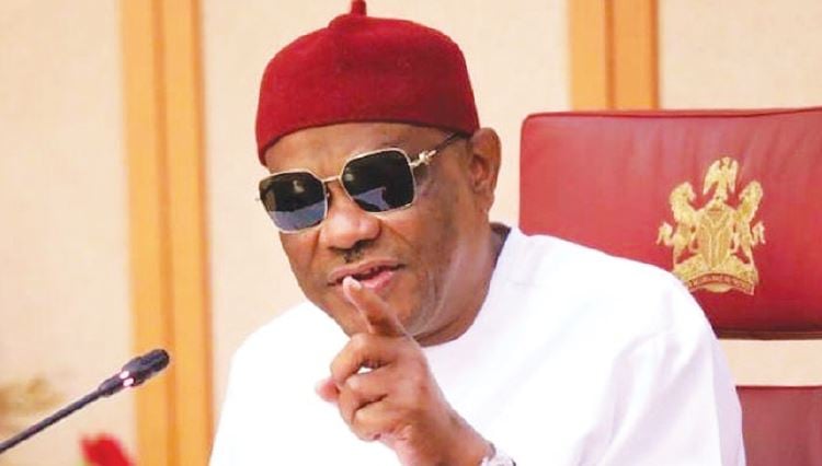 Rivers State Governor Nyesom Wike addressing staff at the AGIS office, enforcing new mobile phone ban after viral incident involving a naval officer.